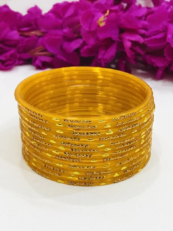 Rose gold bracelets with sleek minimalist designs -Alluring Yellow Color Party Wear Glass bangles For Women