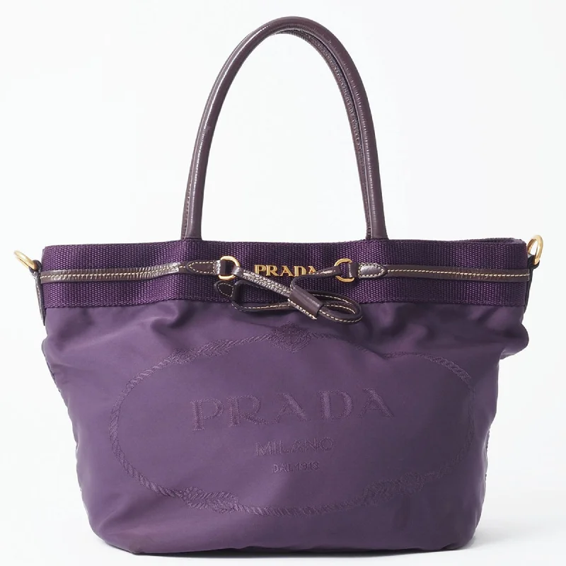 Handle bags with vintage clasps for nostalgia -Prada  Nylon Leather Handbag Tote Bag (Pre-Owned)