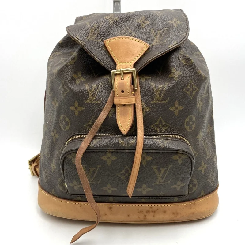 Handle bags with sturdy canvas for longevity -Louis Vuitton  Monogram Leather Backpack (Pre-Owned)