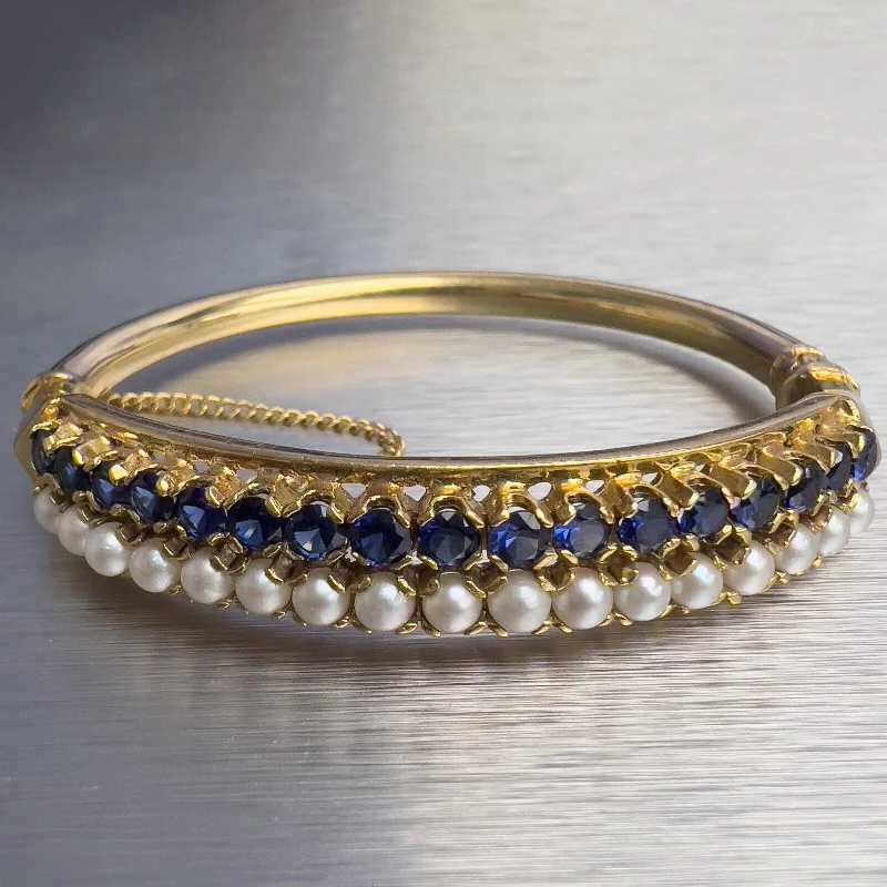 Bangles with pave-set diamonds for dazzle -Antique Victorian 14k Yellow Gold Pearl Sapphire Hinged Bangle Bracelet 6.5"