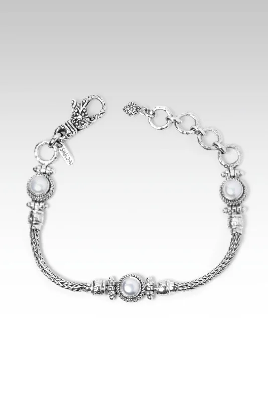 Thin bangles perfect for layering multiple styles -Cheerful Heart Bracelet™ in Freshwater Pearl