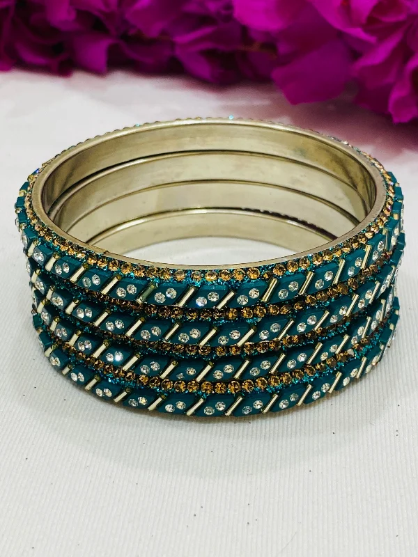 Bangles with pave-set diamonds for dazzle -Lovely Teal Green Metal Bangles With White Stone Work For Women