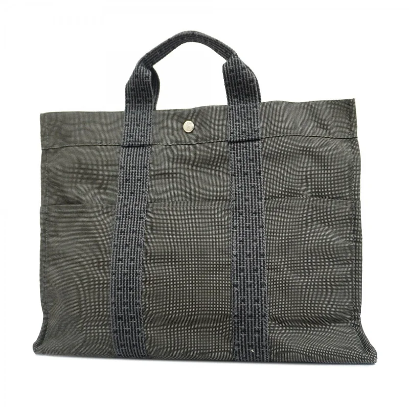 Handle bags with bold logos for branding -Hermes  Canvas Tote Bag (Pre-Owned)