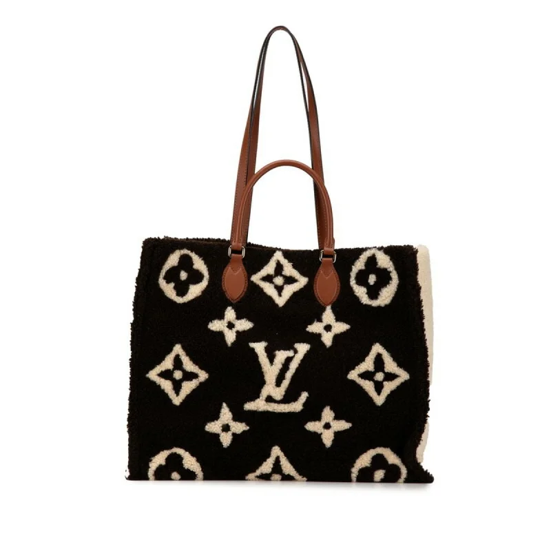 Handle bags with modern cutouts for style -Louis Vuitton   Leather Shoulder Bag Tote Bag (Pre-Owned)