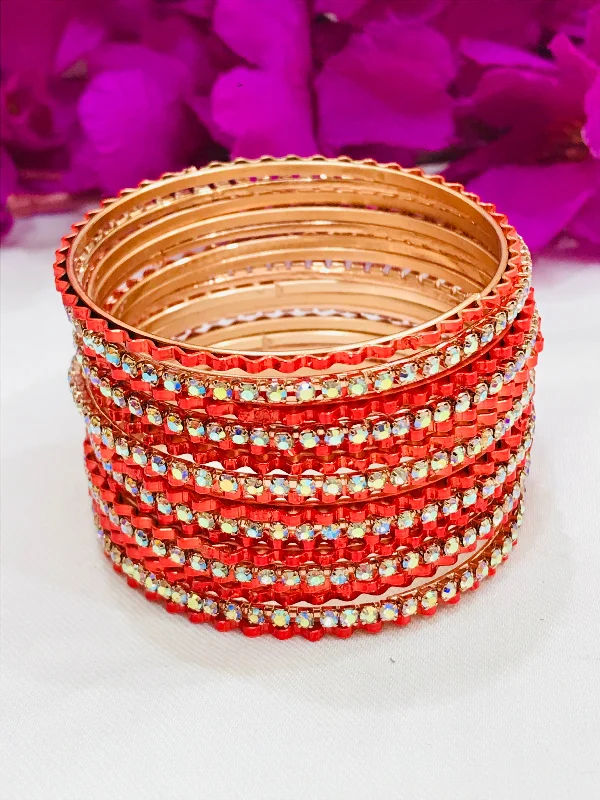 Bracelets with tiger eye for warm bands -Appealing Orange Colored Fancy Metal Bangles With White Stones