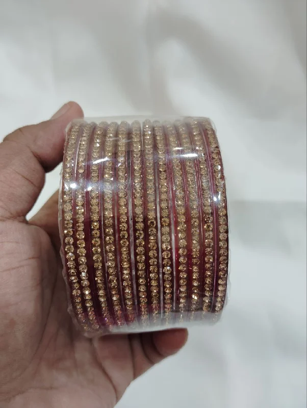 Bangles with hammered silver for rustic appeal -Attractive Maroon Colored Glass Bangles With Sparkling Stone For Women