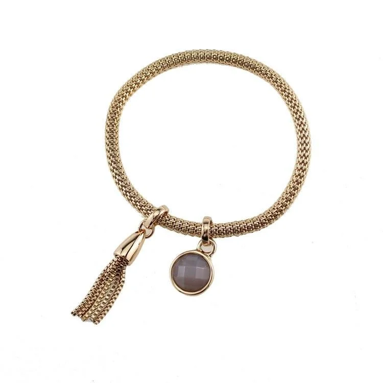 Bangles with polished onyx for bold sleekness -Tassel Charm Bracelet