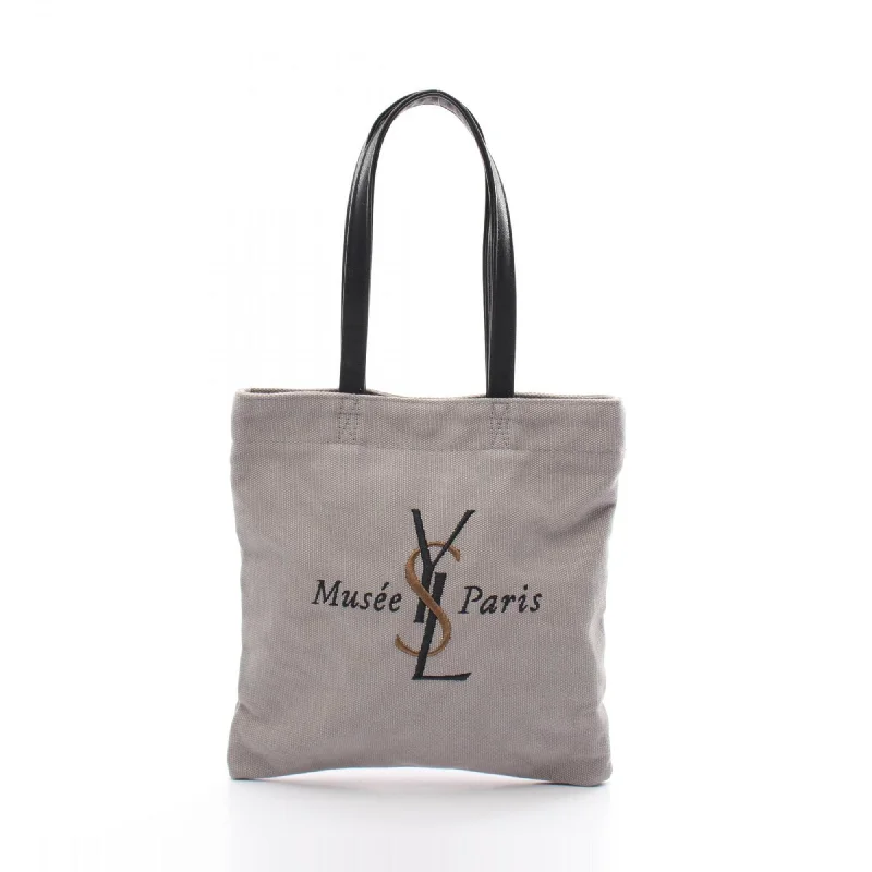 Handle bags with minimalist sleek silhouettes -Yves Saint Laurent   Canvas Leather Tote Bag (Pre-Owned)