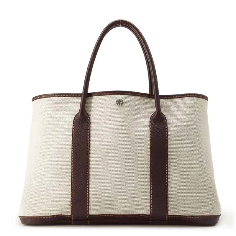 Handle bags with spacious interiors for storage -Hermes  Marron Toile H Tote Bag (Pre-Owned)