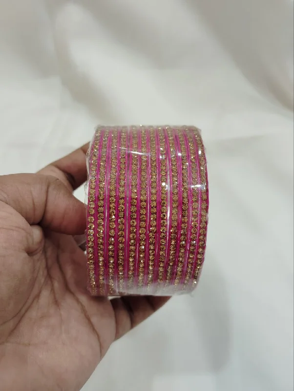 Bangles with tiger eye bands for warmth -Charming Pink Color Glass Bangles With Stones For Women