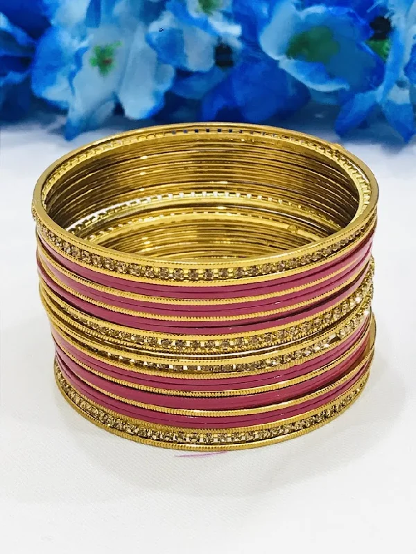 Bangles with malachite stones for green swirls -Attractive Dark Pink Color Stone Designed Party Wear Metal Bangles For Women