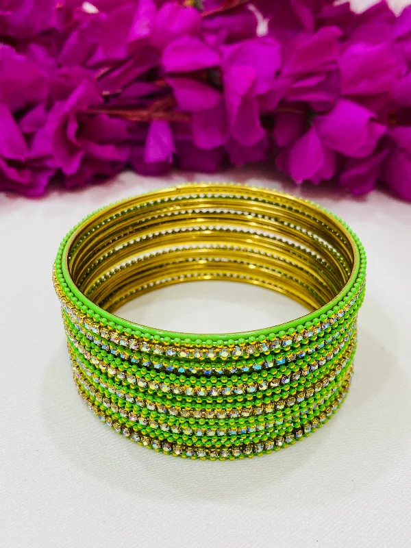 Bangles with peacock ore for iridescent glow -Pleasing Light Green Color Metal Bangles With Glittering Stones For Women