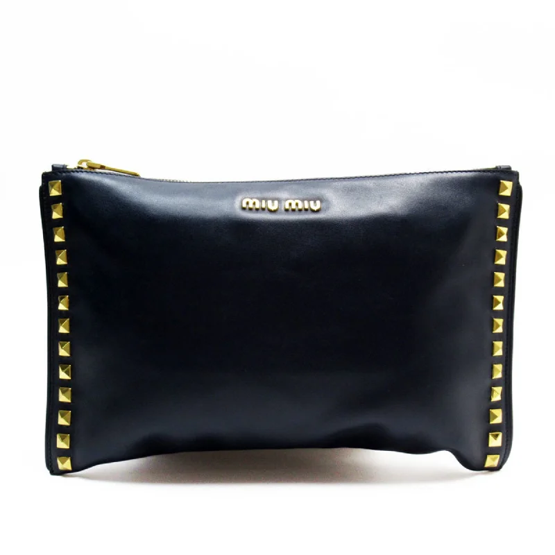 Handle bags with suede accents for texture -Miu Miu  Navy Leather Metal Clutch Bag (Pre-Owned)