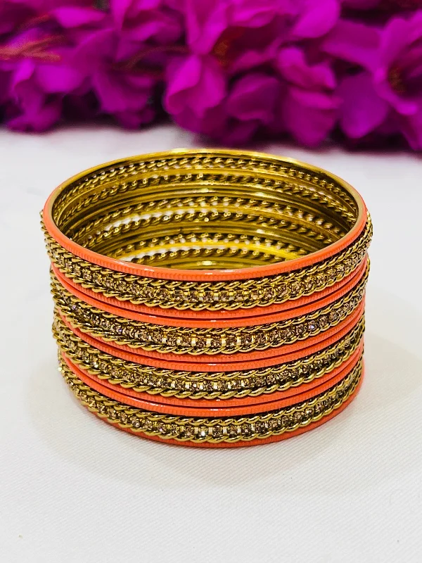 Bracelets with vintage claw-set gemstones -Appealing Orange Color Metal Bangles With Stone Work For Women