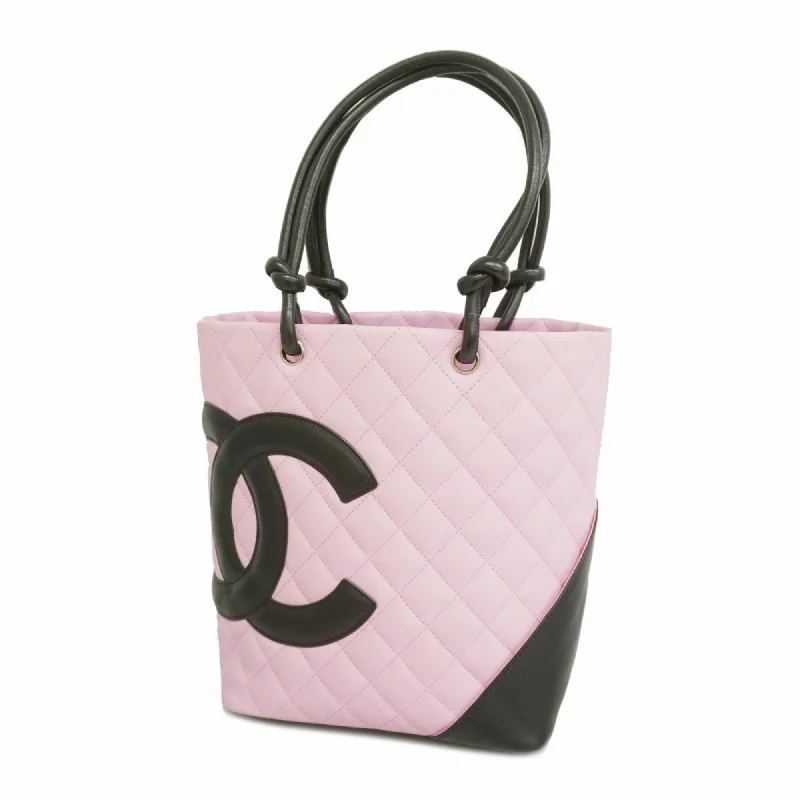 Handle bags with subtle embroidery for detail -Chanel  pink Leather Tote Bag (Pre-Owned)