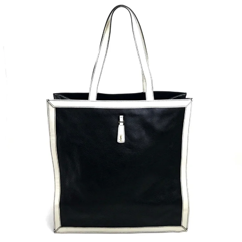 Handle bags with playful pom-poms for charm -Yves Saint Laurent  Leather Tote Bag (Pre-Owned)