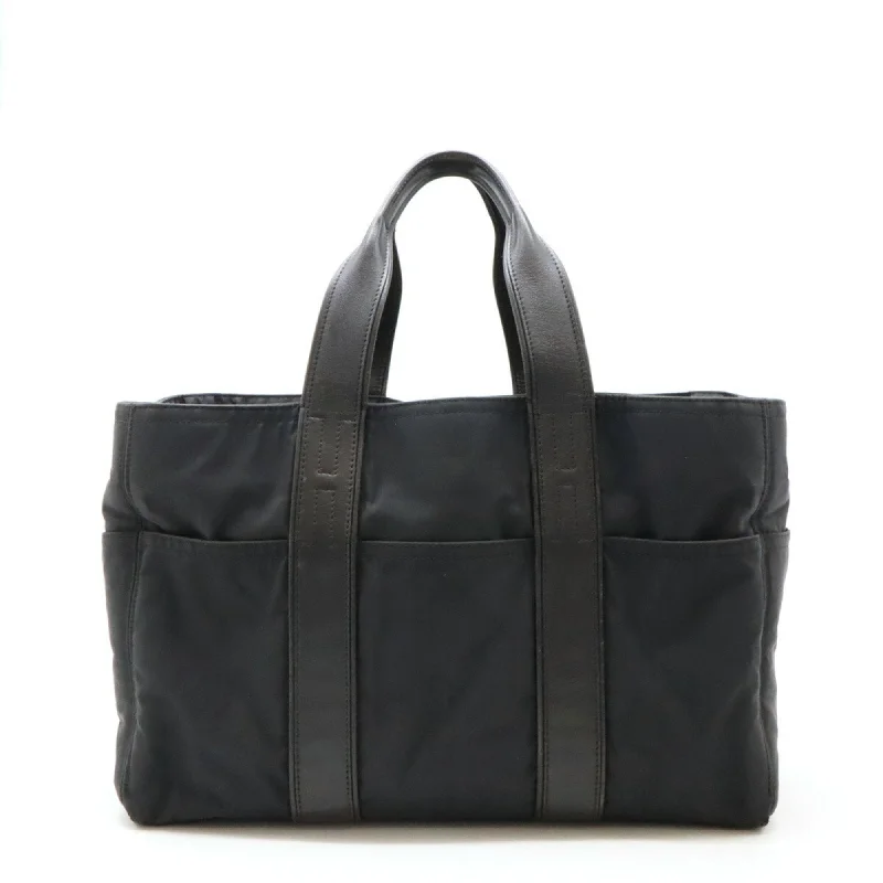 Handle bags with lightweight nylon for ease -Hermes  Nylon Leather Handbag Tote Bag (Pre-Owned)