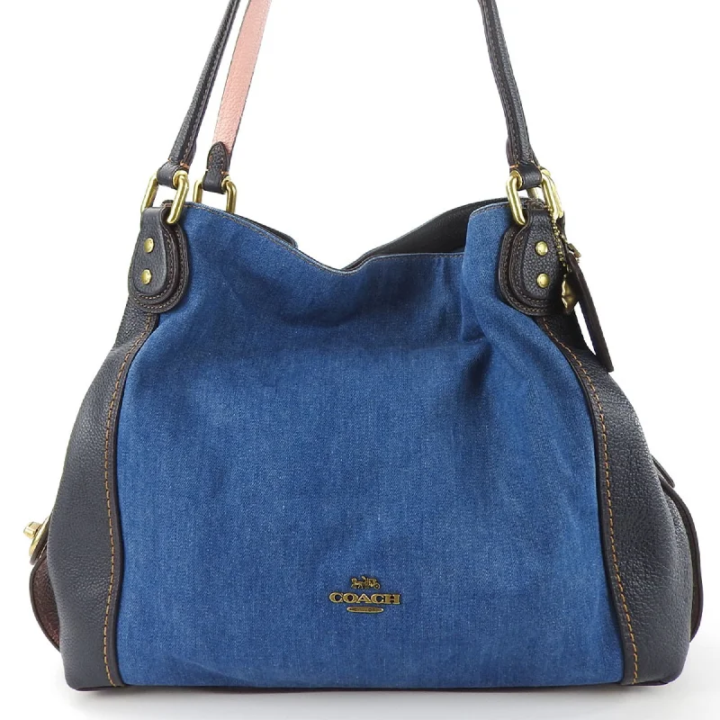 Handle bags with inner compartments for essentials -Coach blue Navy pink blue Leather Tote Bag (Pre-Owned)