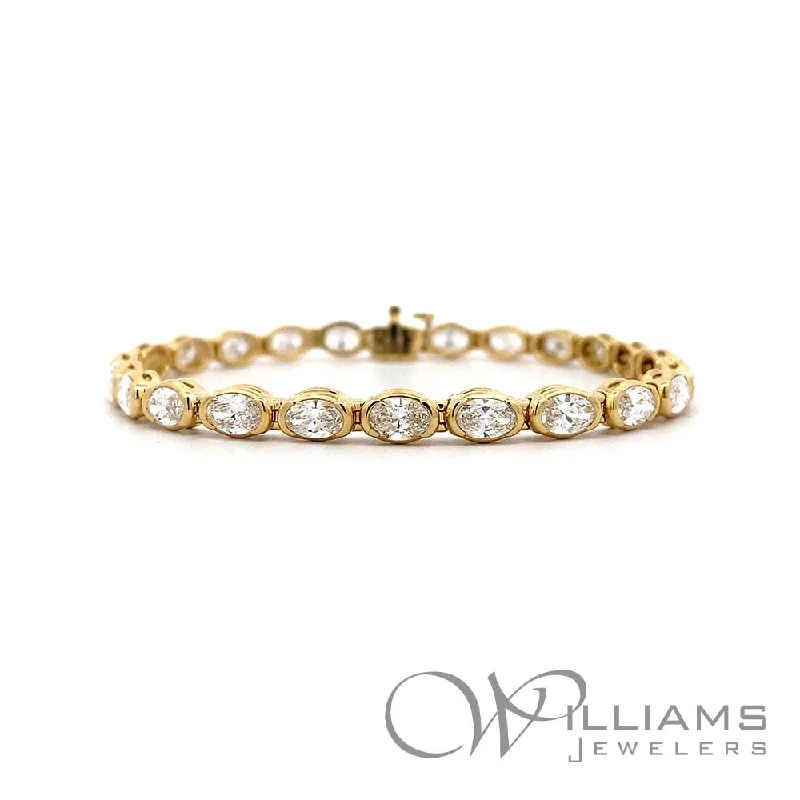 Bangles with claw-set stones for security -Williams Signature 18 Karat Diamond Bracelet