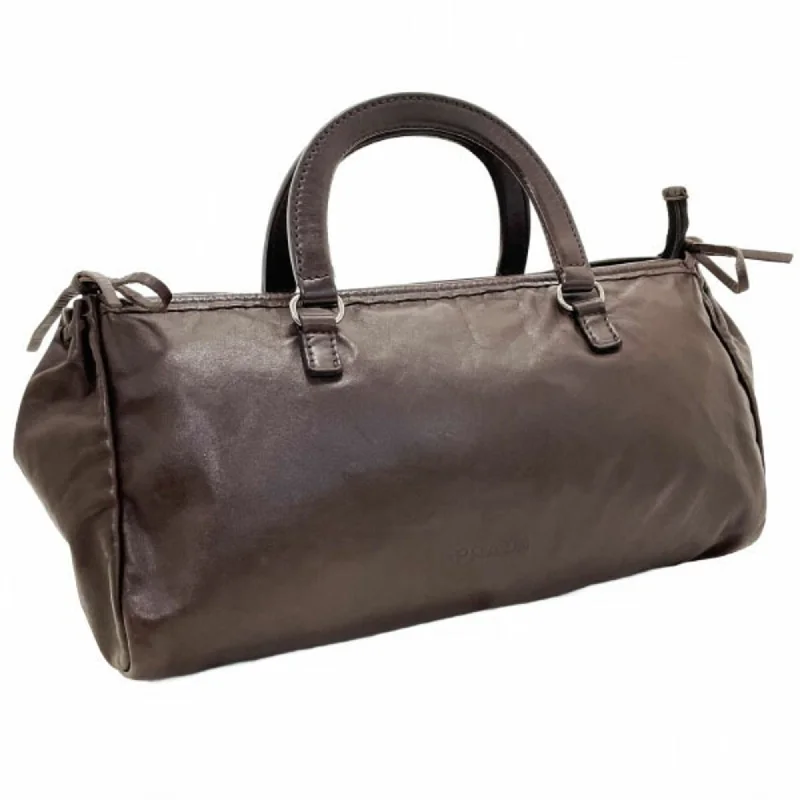 Handle bags with sturdy leather grip accents -Prada  Leather Handbag Tote Bag (Pre-Owned)