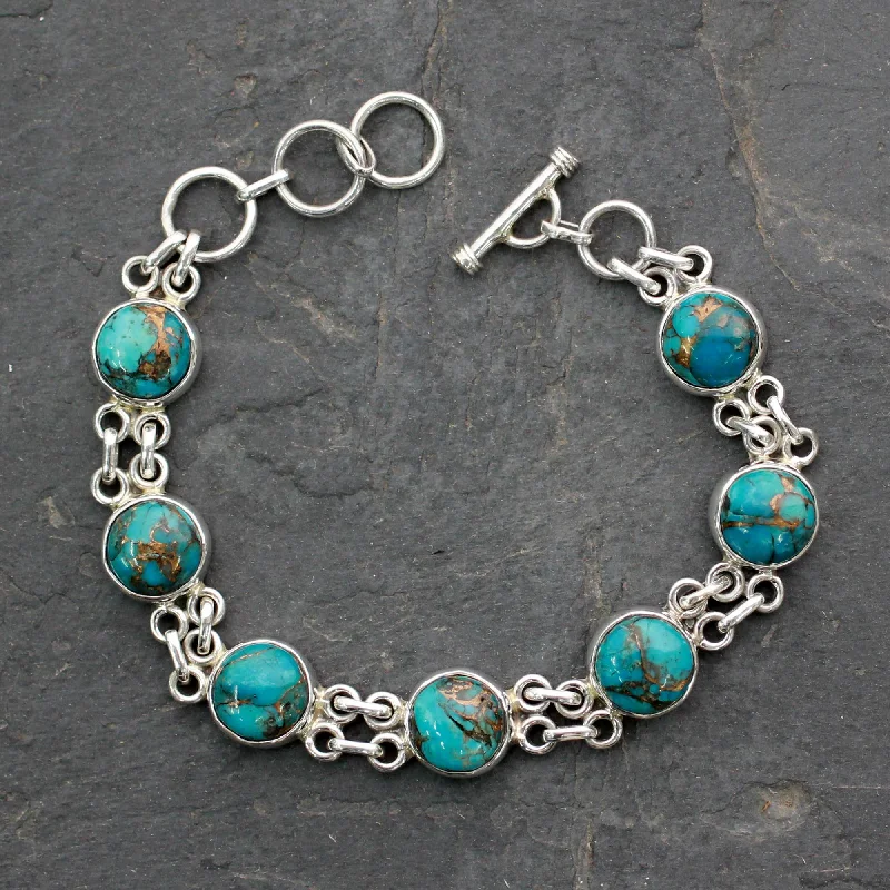 Silver bangles featuring vibrant turquoise stone inlays -Sky Paths Silver and Comp Turquoise Bracelet from India Jewelry