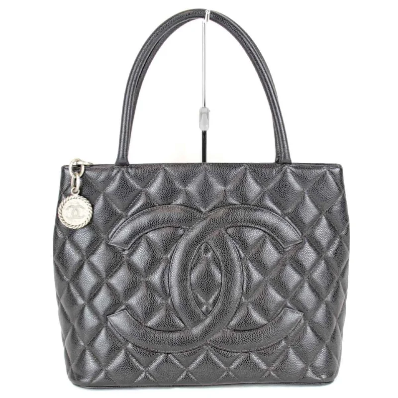 Handle bags with bold text for statements -Chanel  Caviar Leather Tote Bag (Pre-Owned)