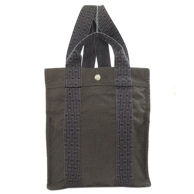 Handle bags with perforated details for style -Hermes  Canvas Backpack (Pre-Owned)