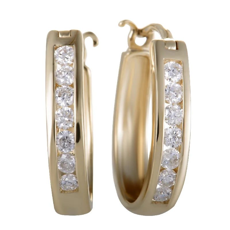 Hoop earrings with diamond-cut surfaces for added sparkle and shine-~.33ct 14K Yellow Gold Diamond Small Oval Hoop Earrings